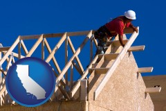 california map icon and a carpenter building a house, working on roof joists