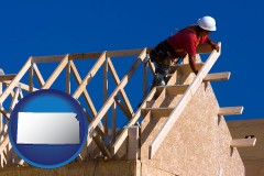 kansas map icon and a carpenter building a house, working on roof joists