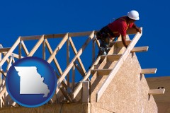 missouri map icon and a carpenter building a house, working on roof joists